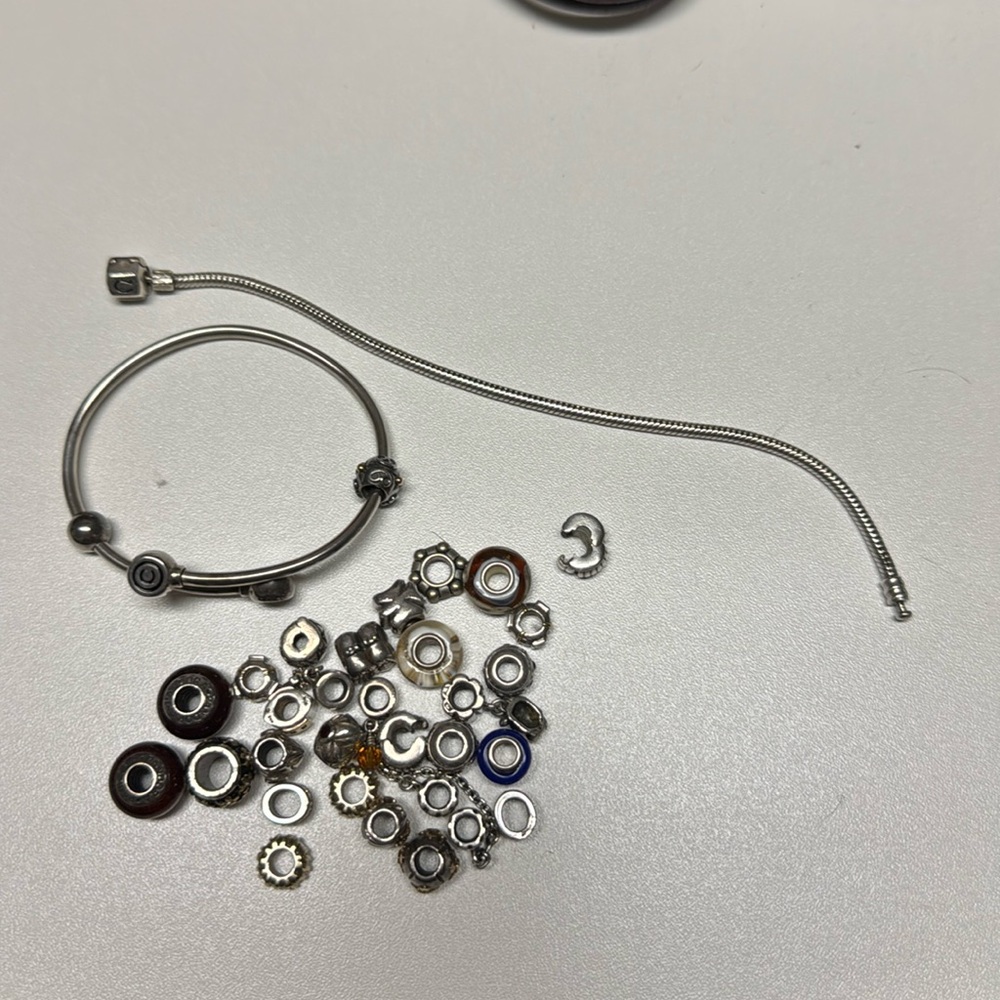 Two pandora bracelets and 30 charms